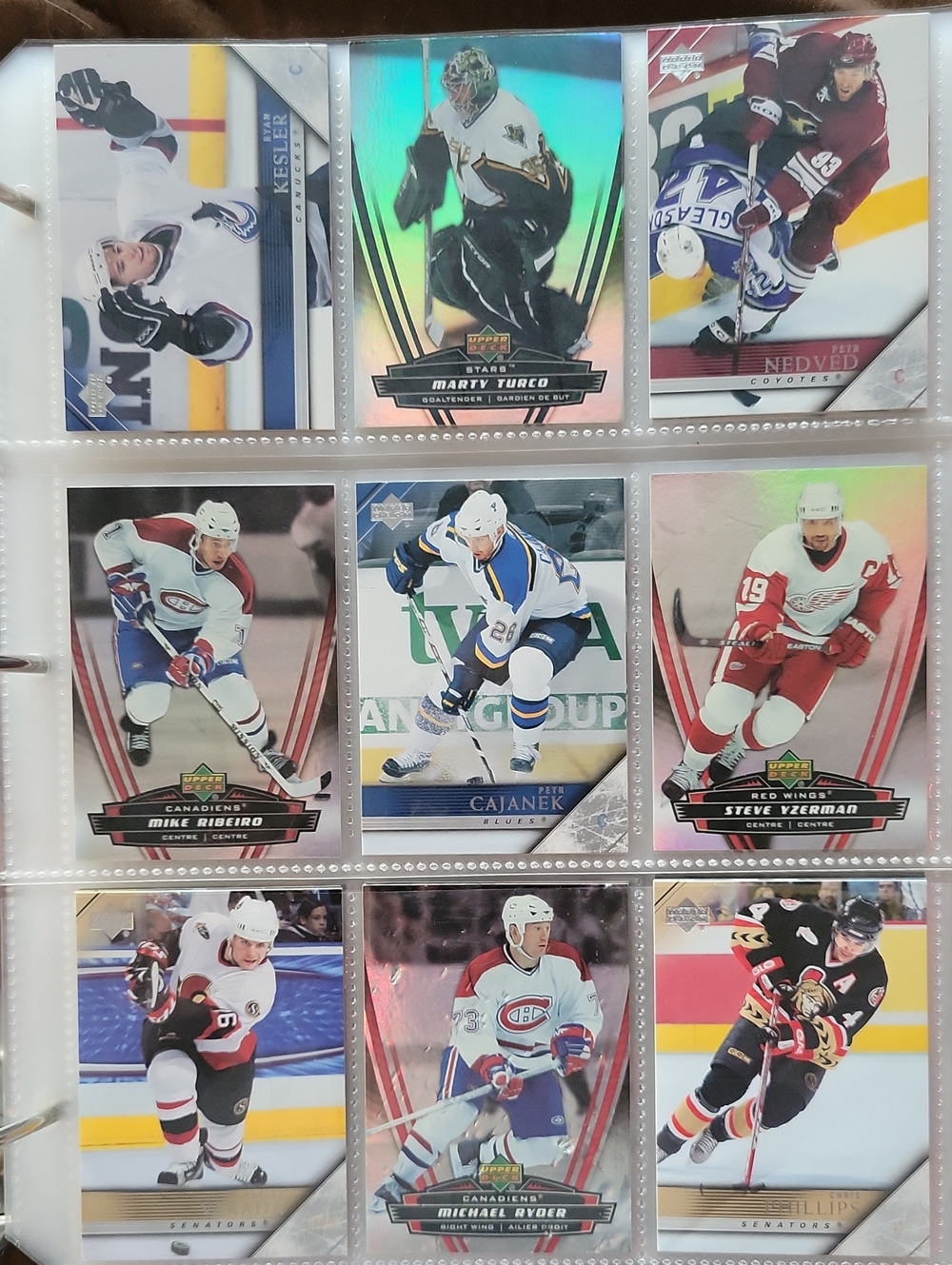 Hockey Card Binder Page — Assorted NHL Player Cards (Red, White, Blue, Black)